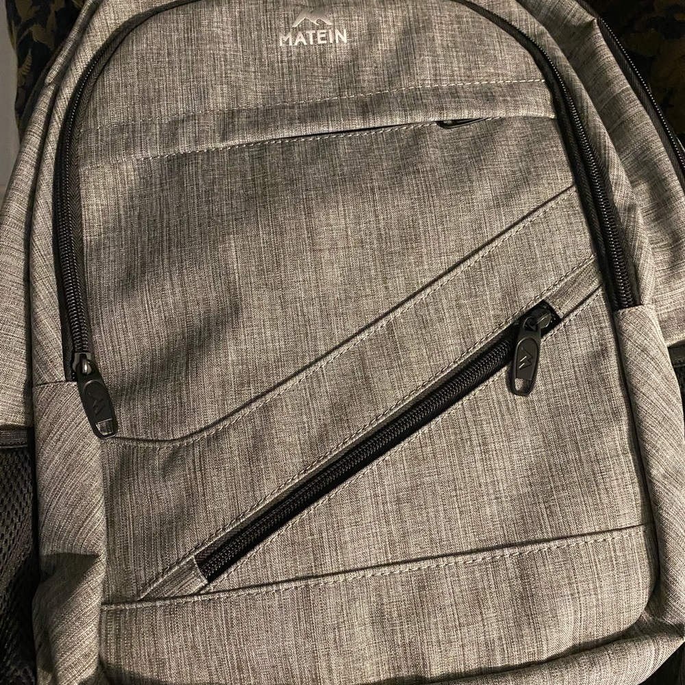 Backpack with a built in charger and office supplies